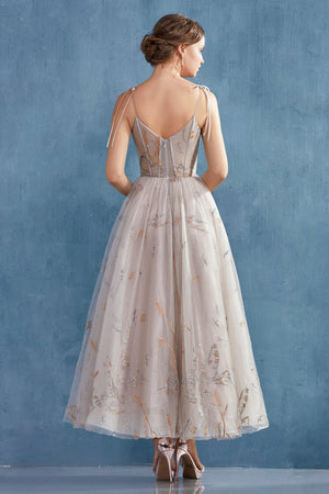 Enchanting Flight: Bird-Embroidered Gown by Enchanted Elegance
