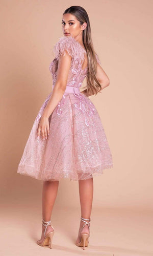 Enchanting Elegance: Portia and Scarlett's Feather-Adorned V-Neck Gown