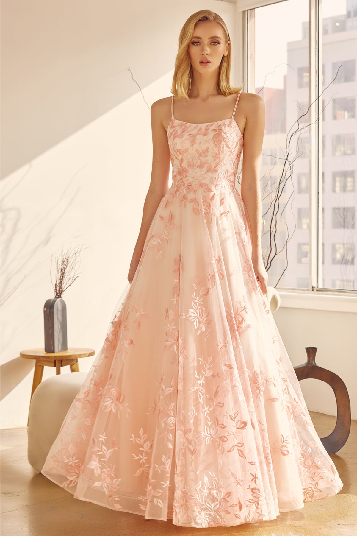 Captivating Elegance: Sleeveless Embroidered Lace Gown by [Brand Name]