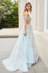 **Elegancia's Ethereal Off-Shoulder Gown: A Vision of Grace and Charm**