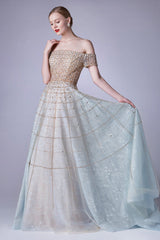 **Elegancia's Ethereal Off-Shoulder Gown: A Vision of Grace and Charm**