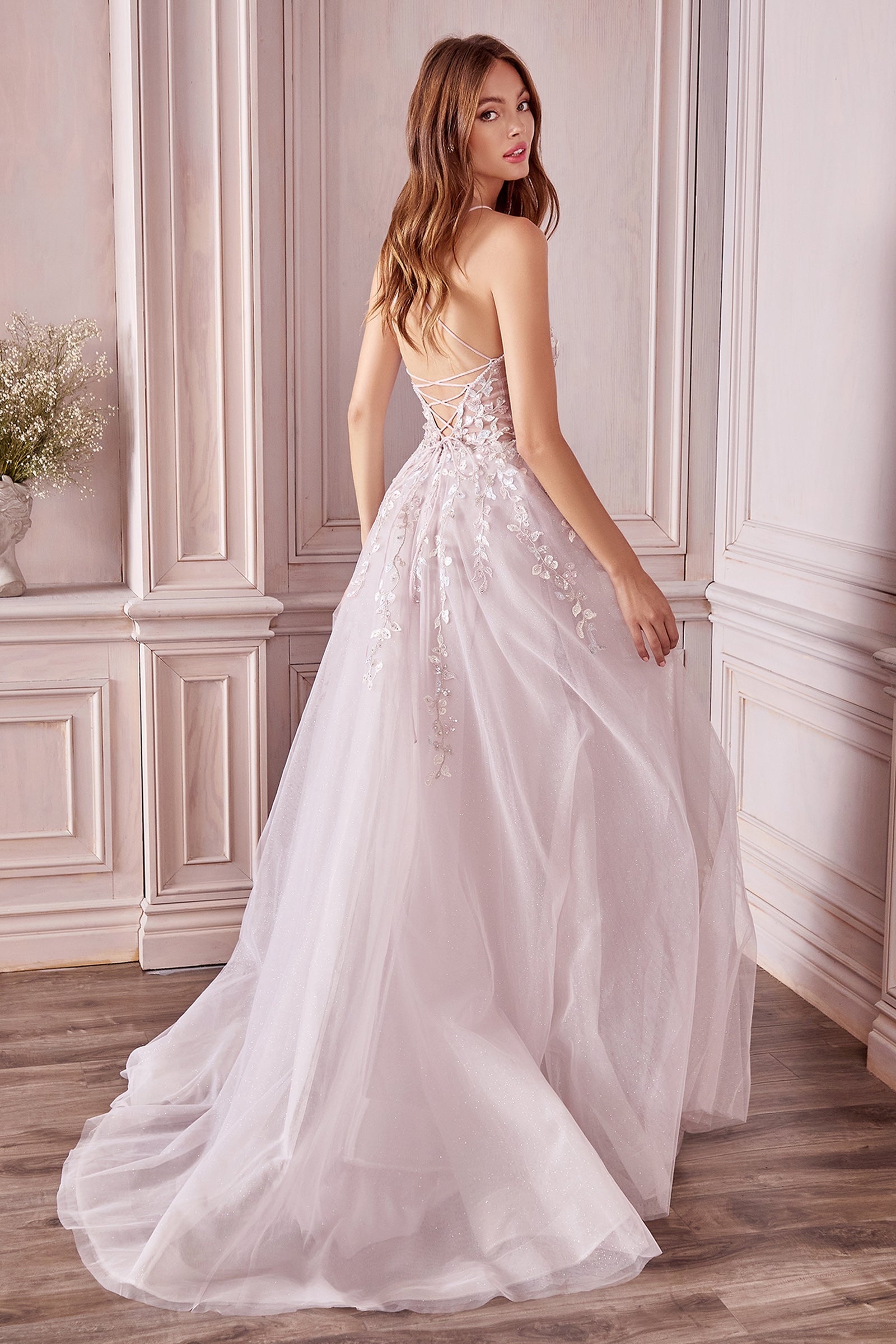 Enchanted Dreams: Captivating V-Neck Gown with Shimmering Accents and Flowing Tulle