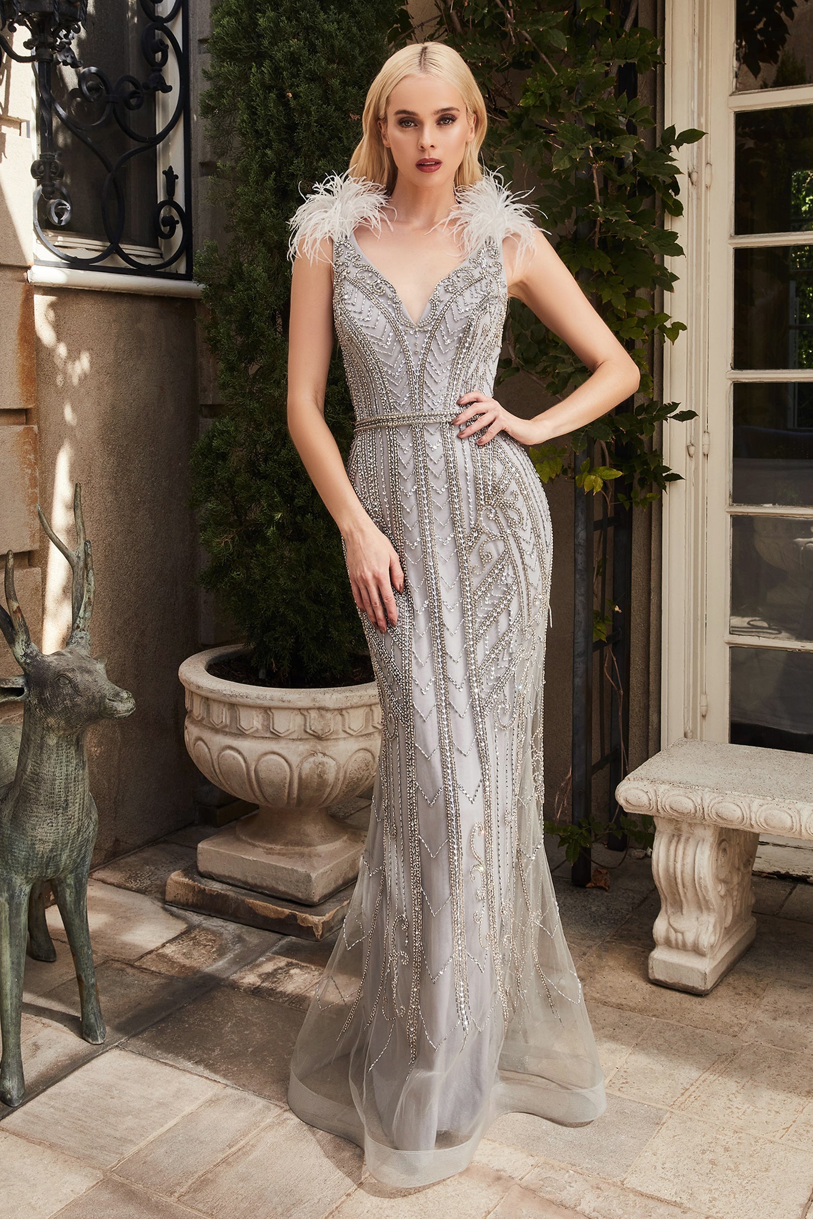 Celestial Radiance: Embody Ethereal Beauty in Our Feather-Adorned Gown