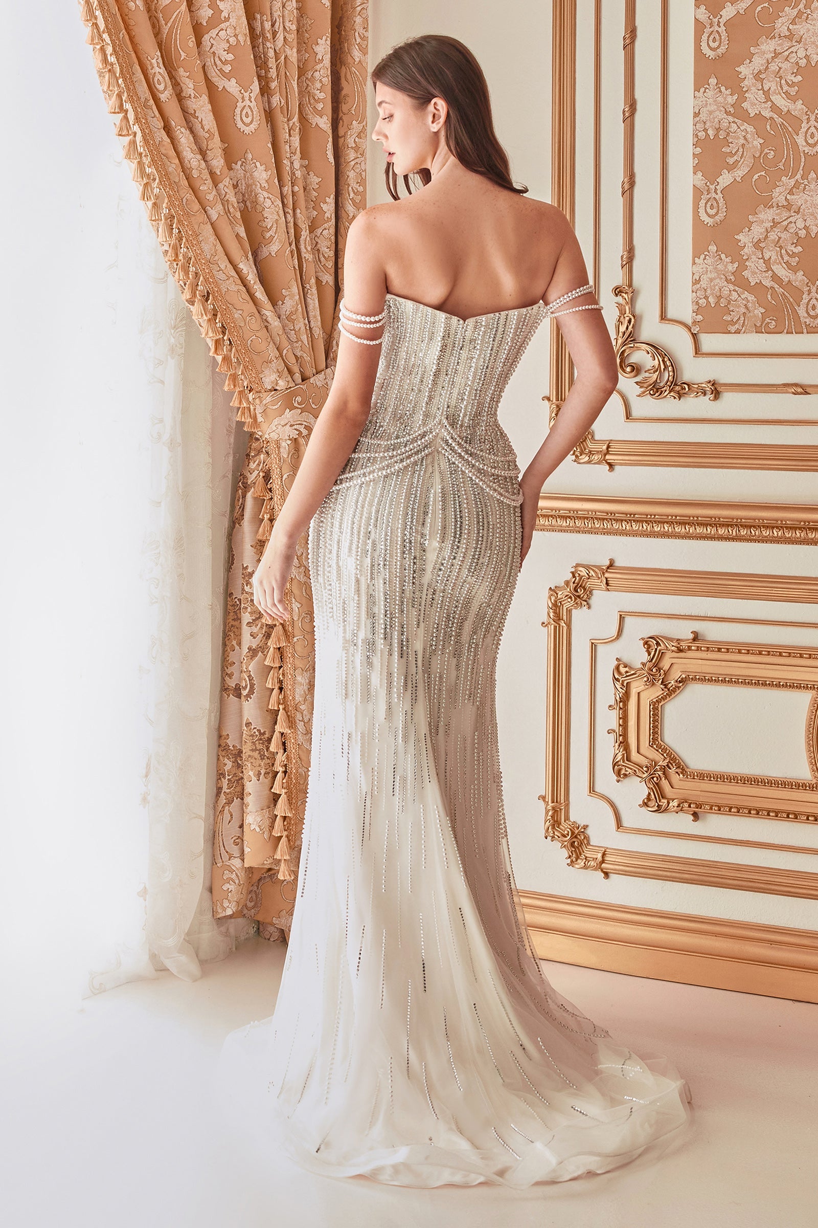 Enchanting Elegance: The Mermaid Silhouette Gown with Cascading Pearls for Unforgettable Occasions