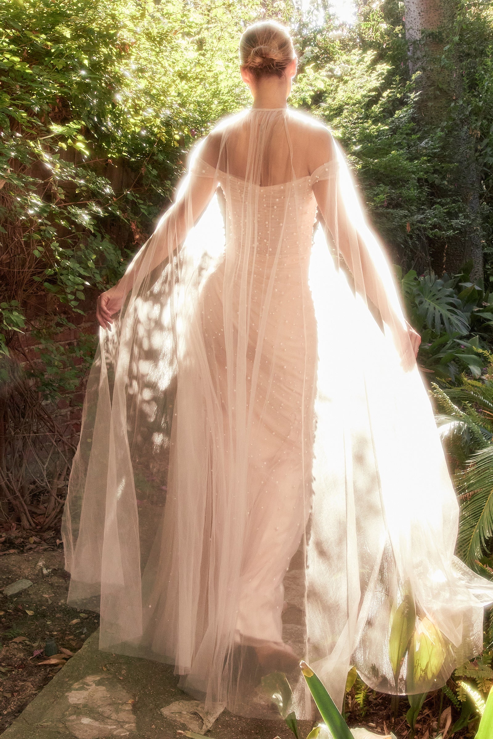 Ethereal Enchantment: Tulle Dress with Pearl Adornments for Magical Moments