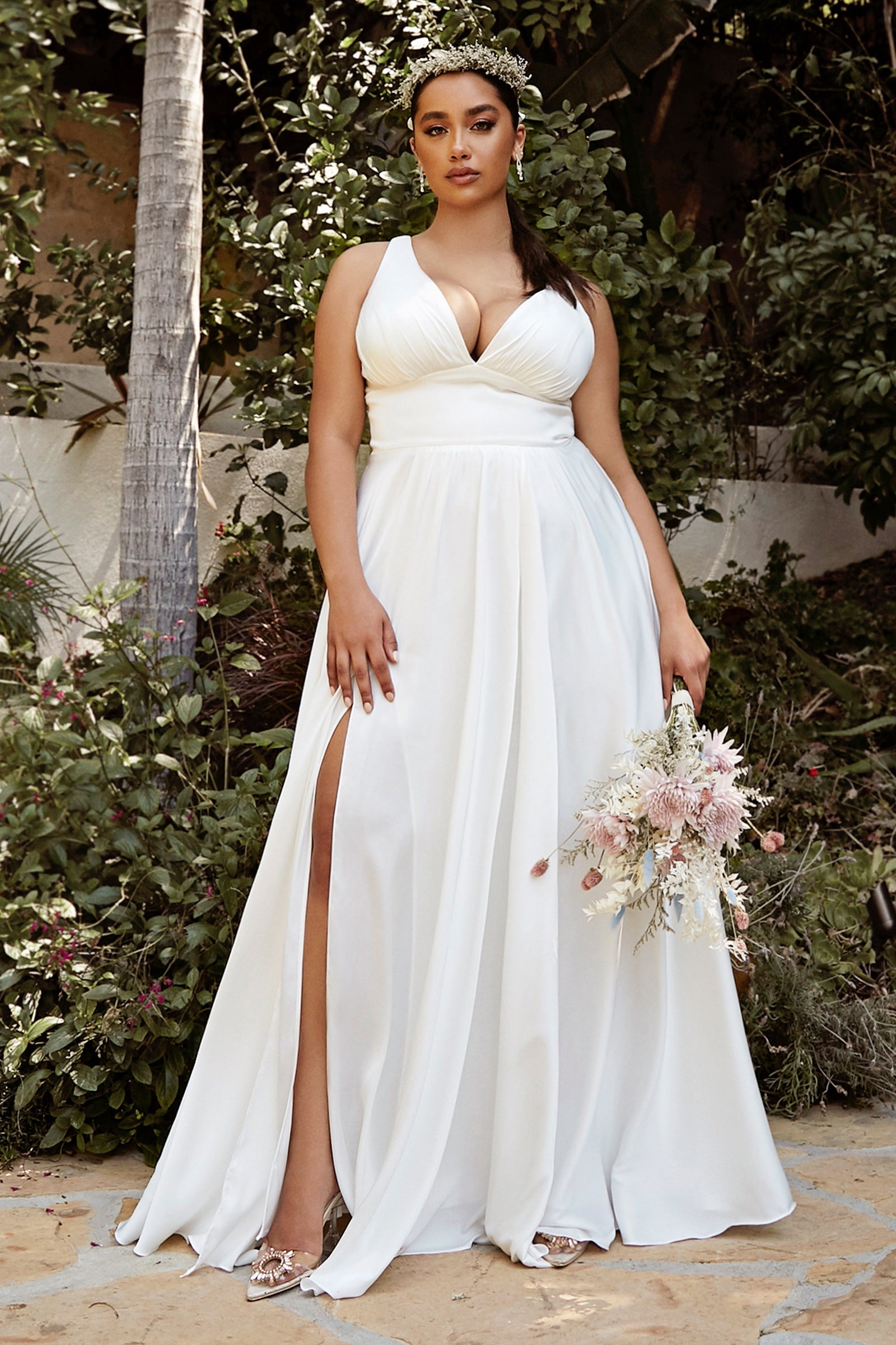 Enchanting Elegance: Cinderella Divine's Thigh-Grazing Wedding Gown