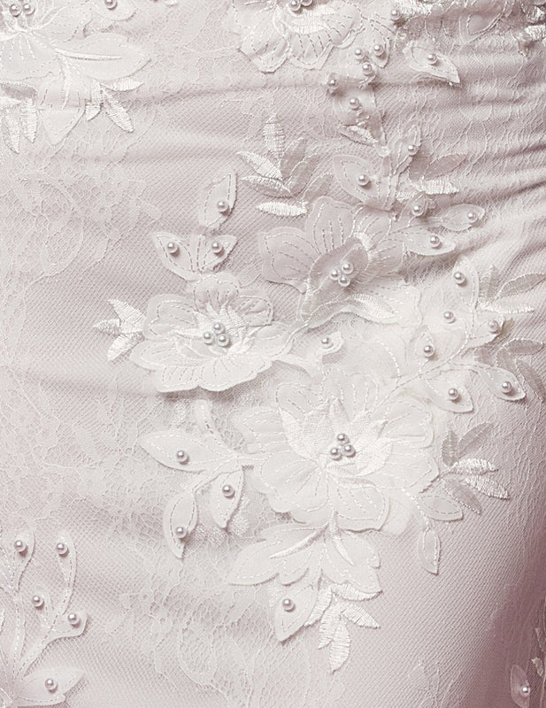 Nox Anabel Bridal: Ethereal Lace and Pearl Wedding Gown for Enchanting Brides