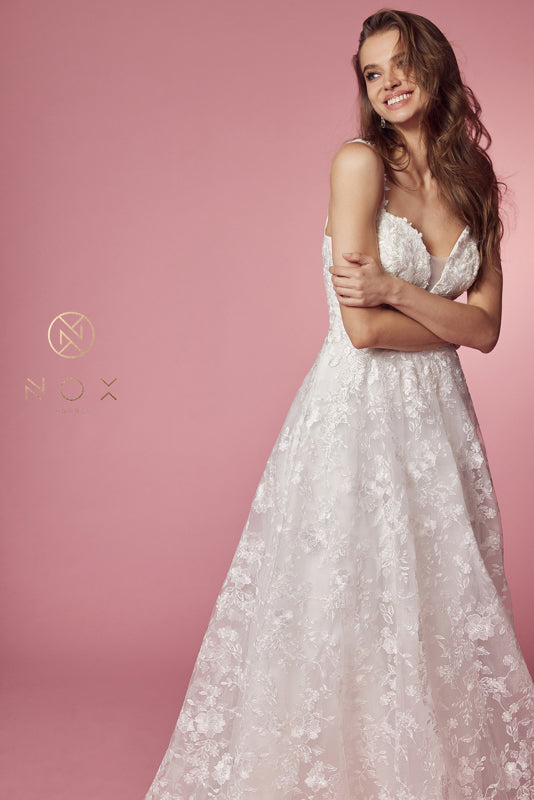 **Nox Anabel's Enchanting Floral Bridal Gown: A Vision of Radiance**