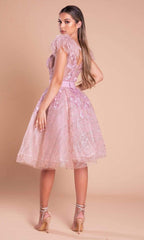 **Enchanting Elegance: Portia and Scarlett's Feather-Adorned Masterpiece**