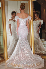 Enchanting Mermaid Dress: Portia and Scarlett's Feather-Adorned Masterpiece