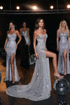 Captivating Glamour: Portia and Scarlett's Shimmering Silver Sheath Gown