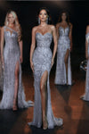 **Captivating Shimmer: Portia and Scarlett's Enchanting Red Carpet Gown**