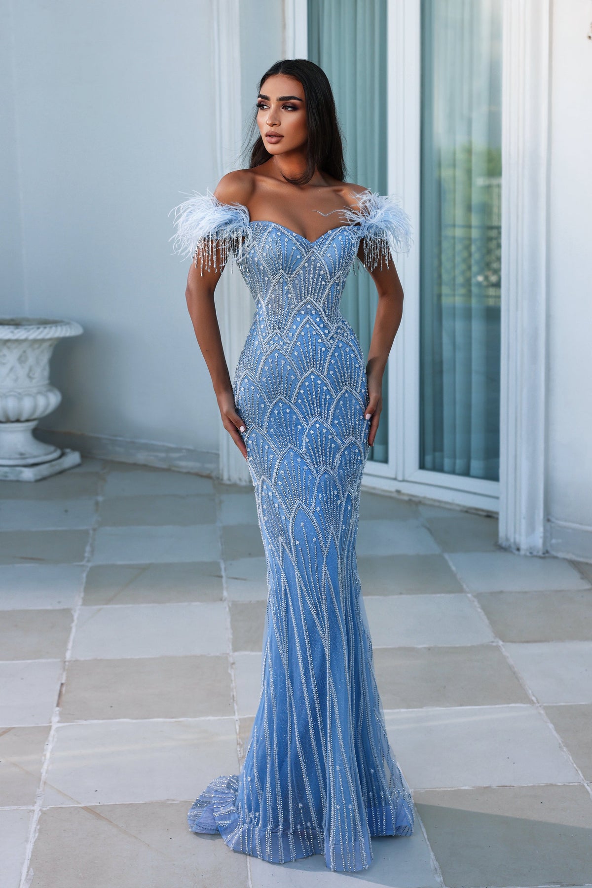 **Portia and Scarlett: Shimmering Feather-Accented Gown for Unforgettable Evenings**